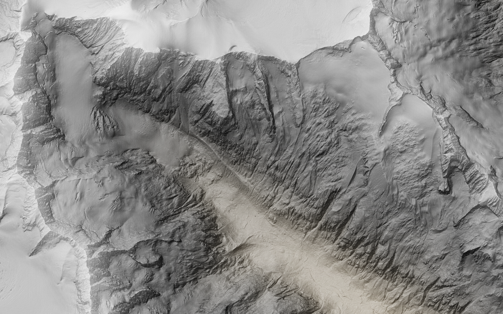 Das Bild zeigt die gefärbte Reliefschattierung vom Chelenalptal und dem Chelengletscher mit den umliegenden Berggipfeln.