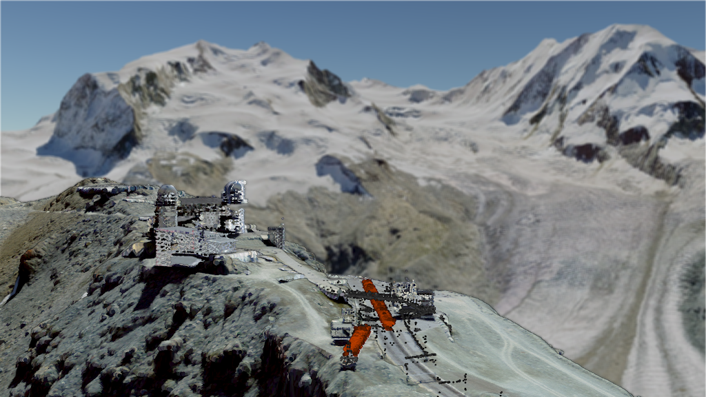 L'immagine mostra l'osservatorio di Gornergrat con la stazione ferroviaria di Gornergrat e il massiccio del Monte Rosa sullo sfondo.