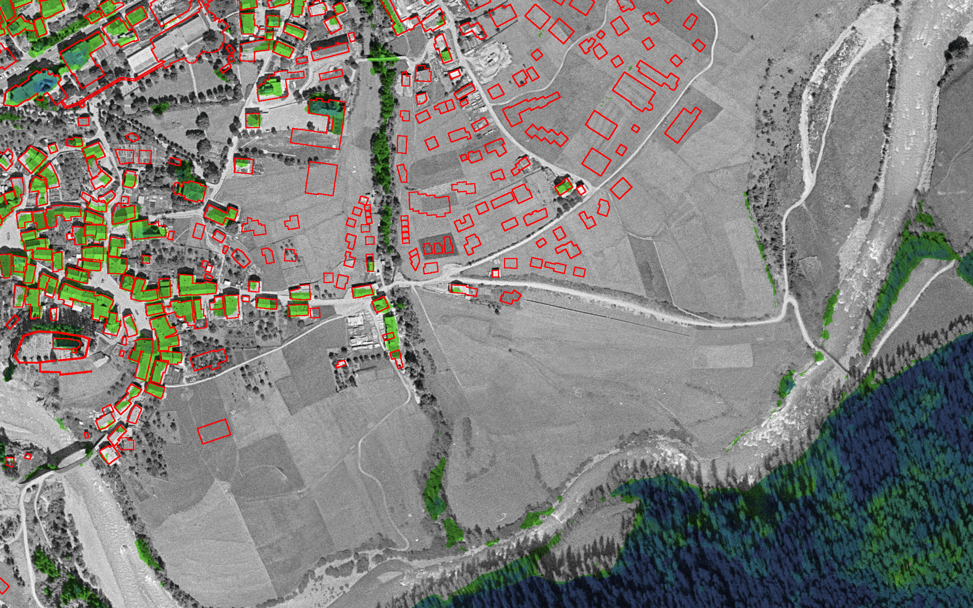 Die Bäume des an Scuol grenzenden Waldes sind dunkelblau oder dunkelgrün eingefärbt, zahlreiche Häuser in Scuol sind hellgrün eingefärbt.