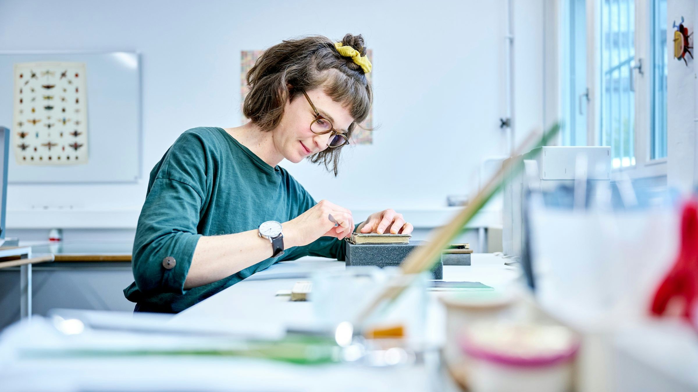 Lea Dauwalder restoring a field booklet