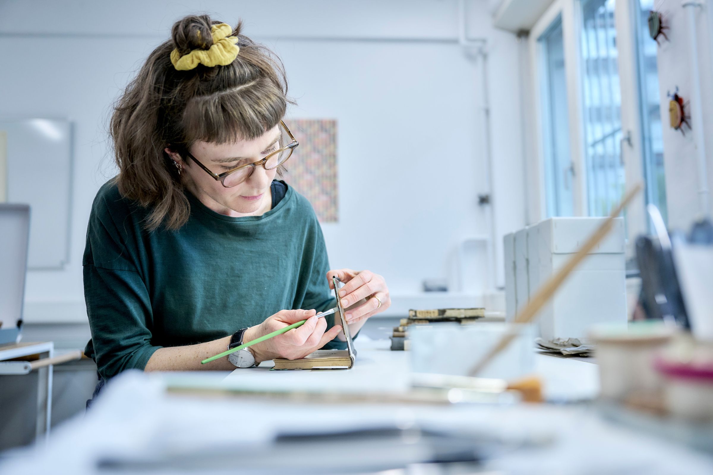 Lea Dauwalder restoring a field booklet
