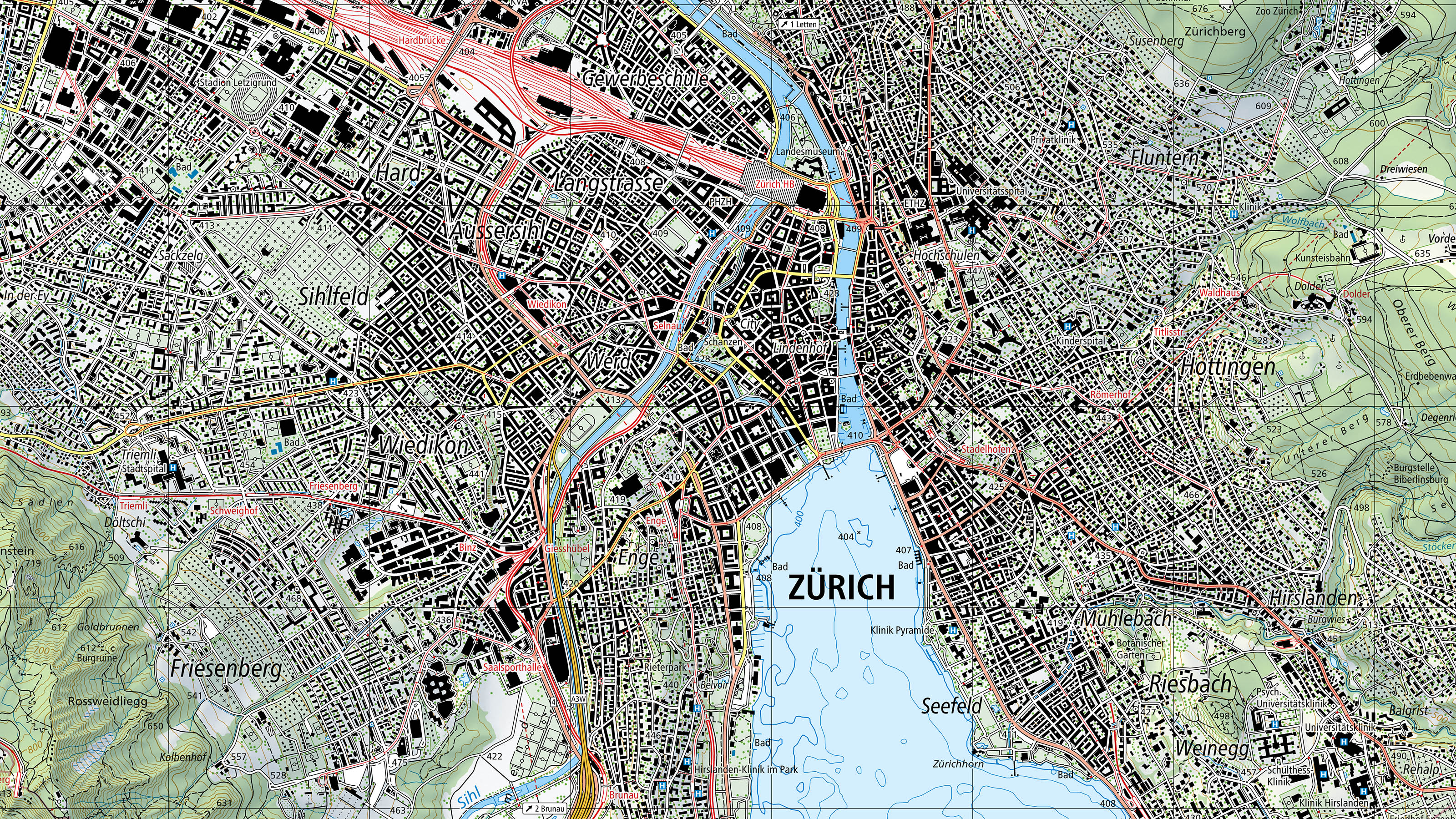 Extrait de la carte nationale dans son nouveau design. Entre autres, les lignes de chemin de fer apparaissent désormais en rouge, les caractères sont sans empattement et les routes sont de différentes couleurs en fonction de leur importance pour le trafic.