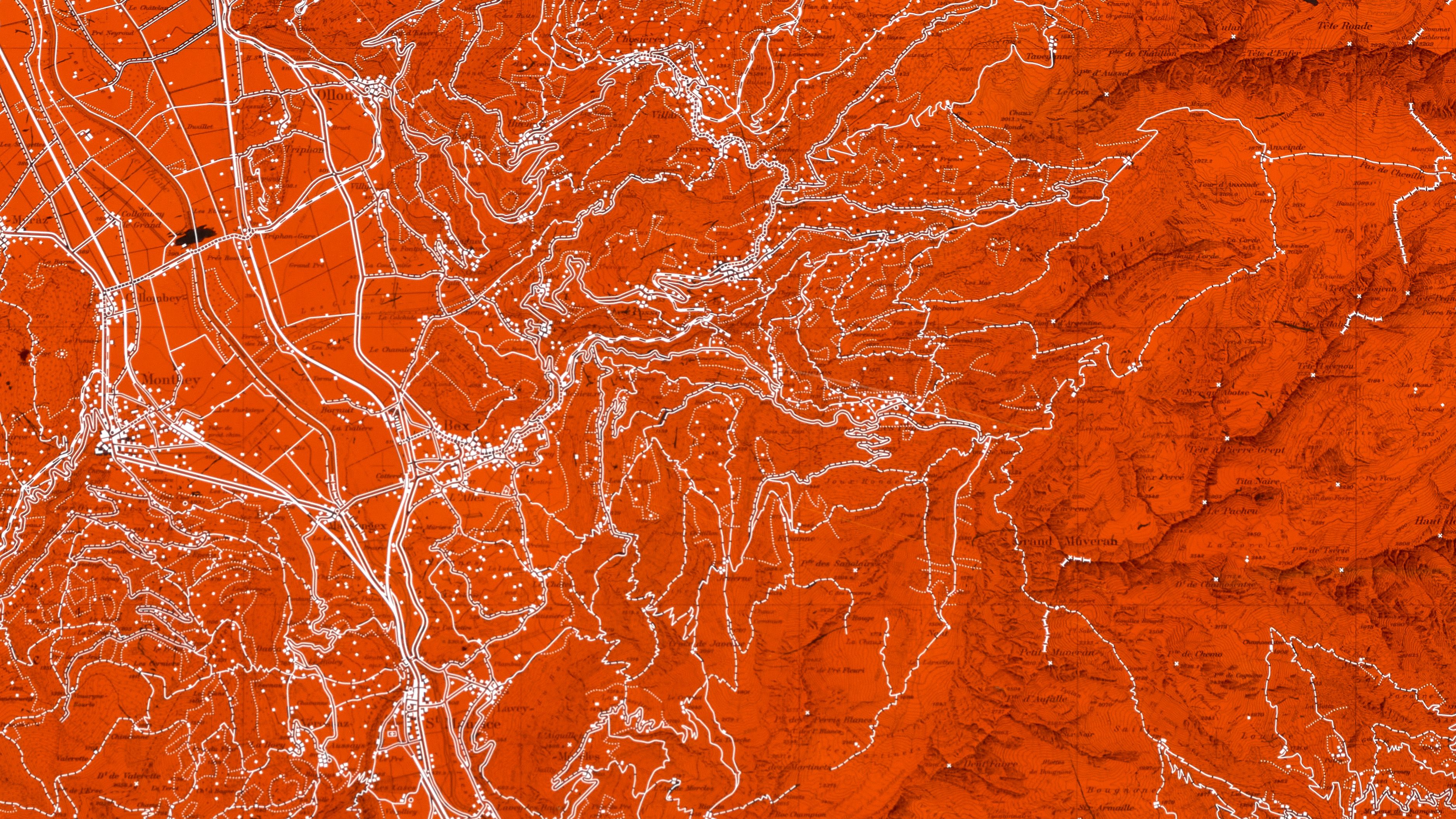 Dans une couche de vernis sur verre, la situation est gravée. La situation, ce sont des maisons et des rues.