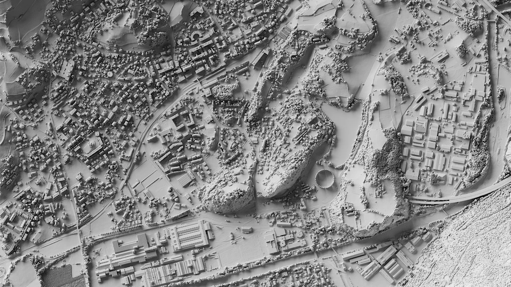 L'image montre le modèle numérique de surface (MNS) dans la région de Sierre (VS).